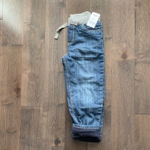 BNWT 5T fleece-lined jeans from Carter’s